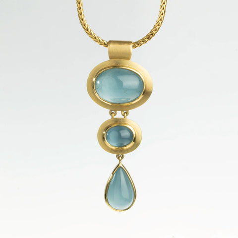 Aquamarine Cabuchonschliff in 750er Gelbgold